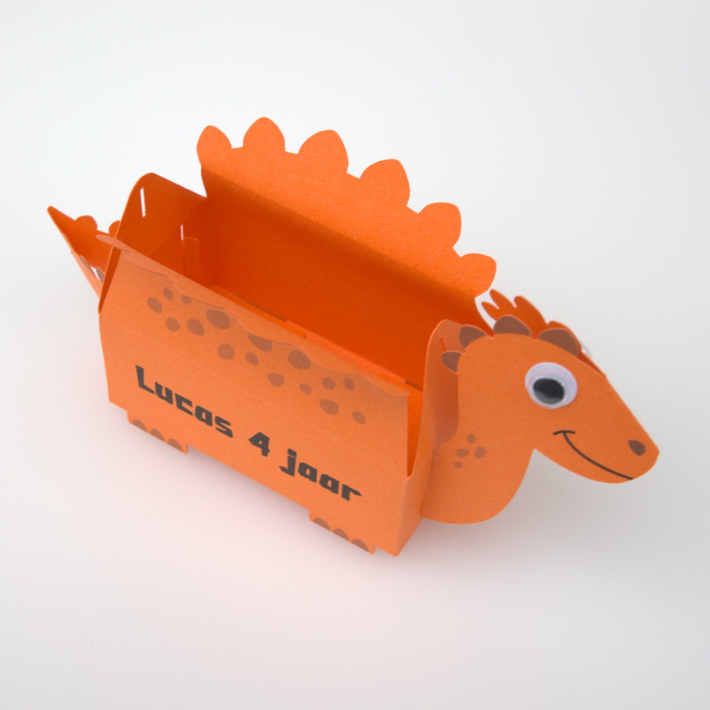 Dino traktatiedoosje oranje open en leeg